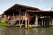 Scenery along the canal leading to Damnoen Saduak Floating Market. 